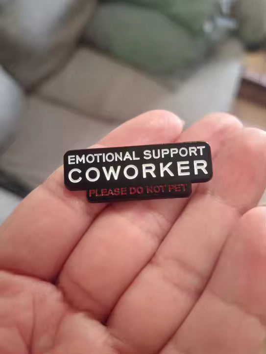 Emotional Support Coworker pin on a jacket